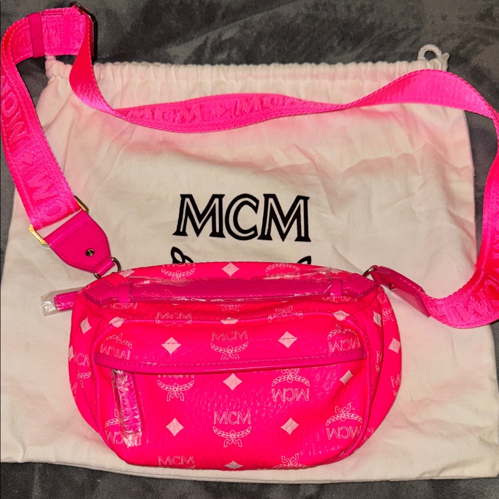 Preloved MCM neon pink visetos small crossbody belt bag pristine condition.